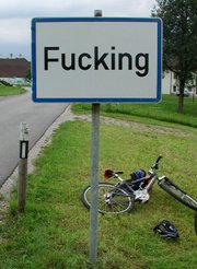 [180px-Fucking,_Austria,_street_sign.jpg]