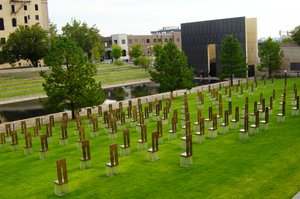 [300px-Oklahoma_City_National_Memorial_viewed_from_the_south_showing_the_memorial_chairs,_Gate_of_Time,_Reflecting_Pool,_and_Survivor_Tree.jpg]