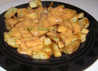 Oven Roasted Potatoes with Cheese Sauce by Pavani