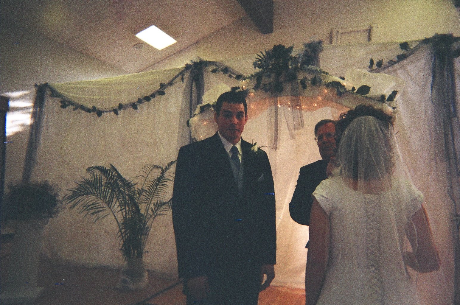 [bride+groom+and+bishop.JPG]