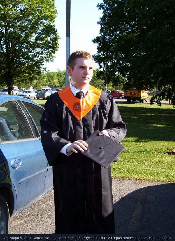 Our son in graduation garb: cap and gown