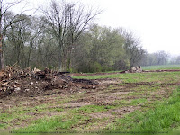 Rubble of two burned barns