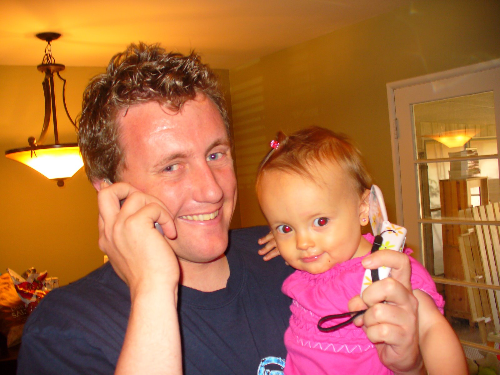[Kalia+and+Daddy+on+their+phones.JPG]
