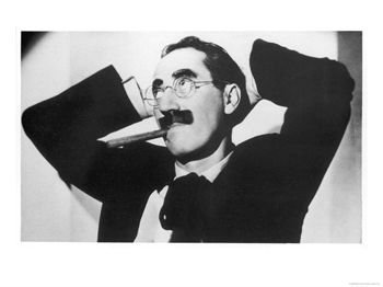 [Groucho-Marx-Julius-Marx-American-Comedian-with-His-Characteristic-Cigar-and-Painted-On-Moustache-Photographic-Print-C12337207.jpg]