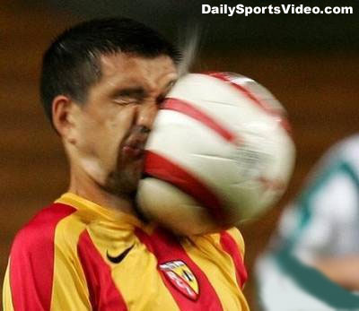 [soccerballface.jpg]