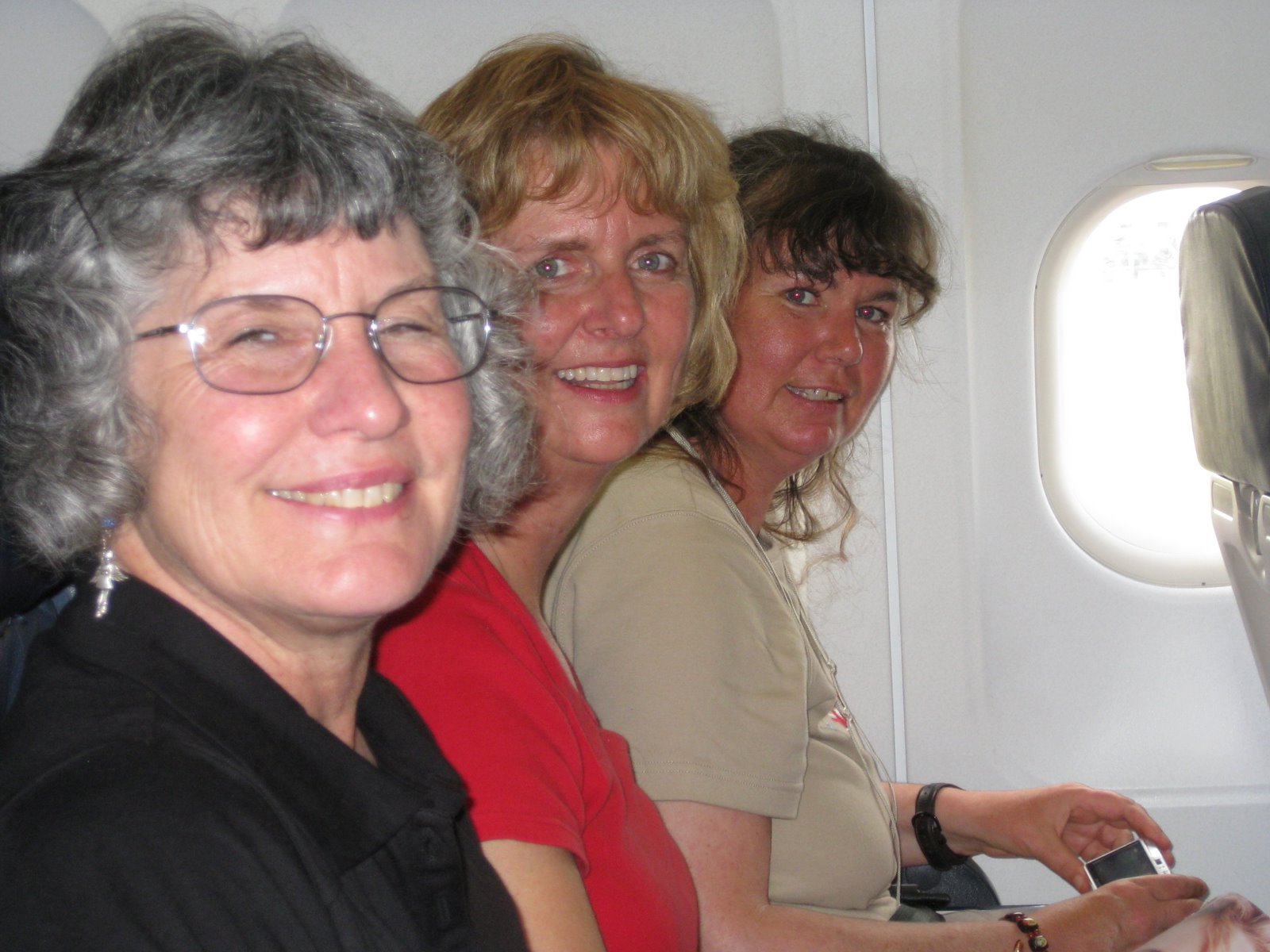 [Cindy+Marsh+Jenn+on+airplane.JPG]