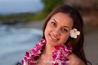 Hawaiian girl with orchid flower lei