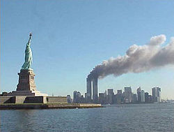 [250px-National_Park_Service_9-11_Statue_of_Liberty_and_WTC_fire.jpg]