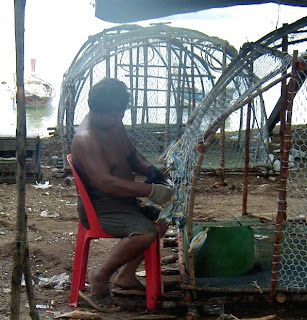 Fixing the nets, Koh Sirey - photo by Paula Monk