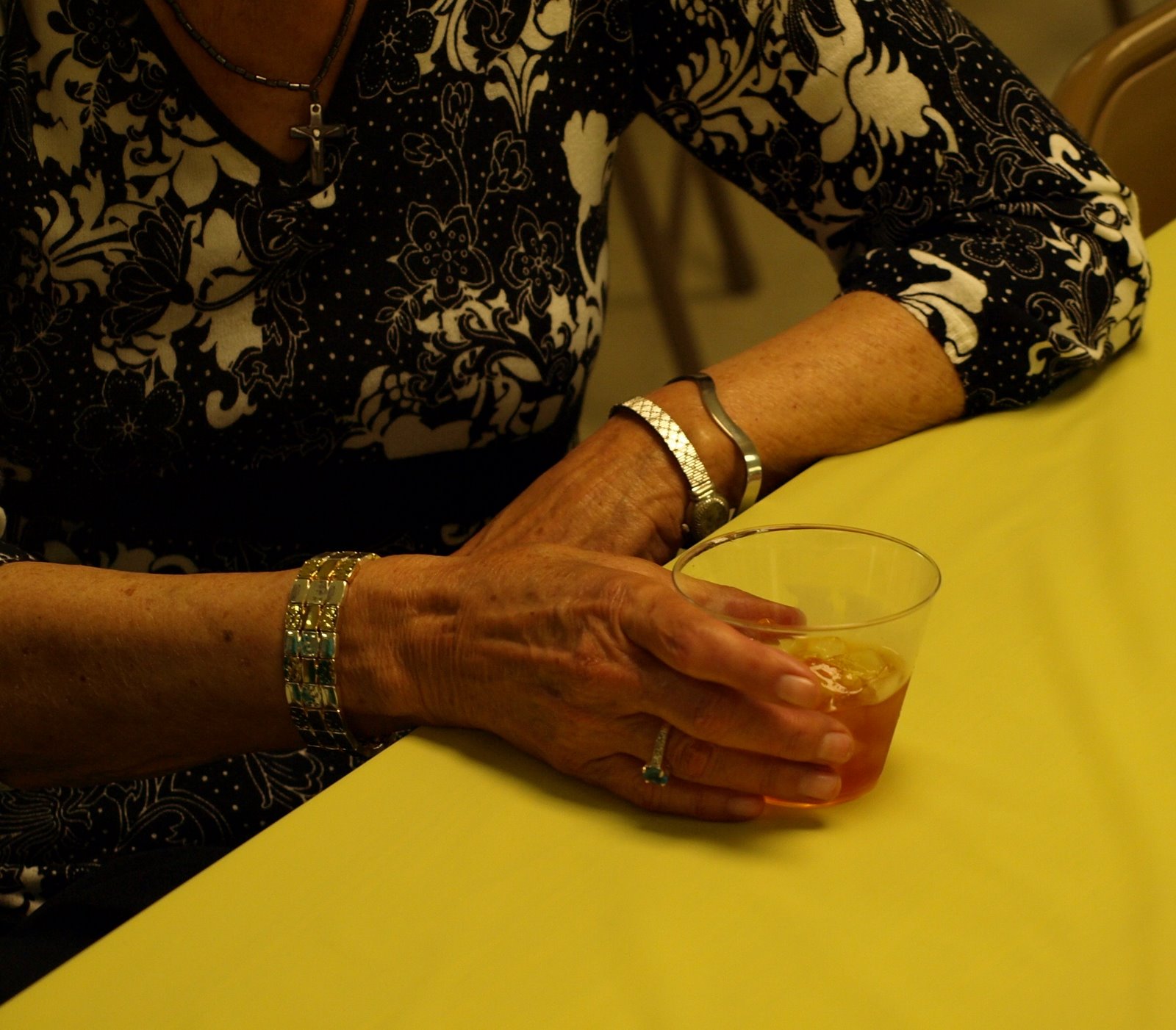 [hand+with+drink+on+yellow.JPG]