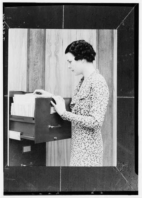 [Woman_filing_Career_Library_of_Congress.jpg]