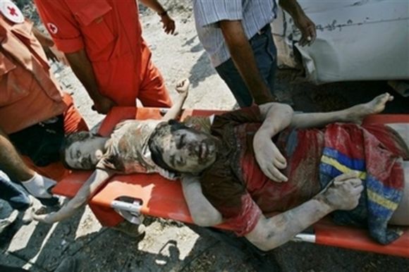 [qana-july30-2006-two-childrens-bodies-stretcher.jpg]