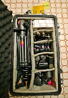 a camera equipment in a suitcase