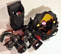 a camera bag and a bag