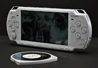 a white handheld video game console