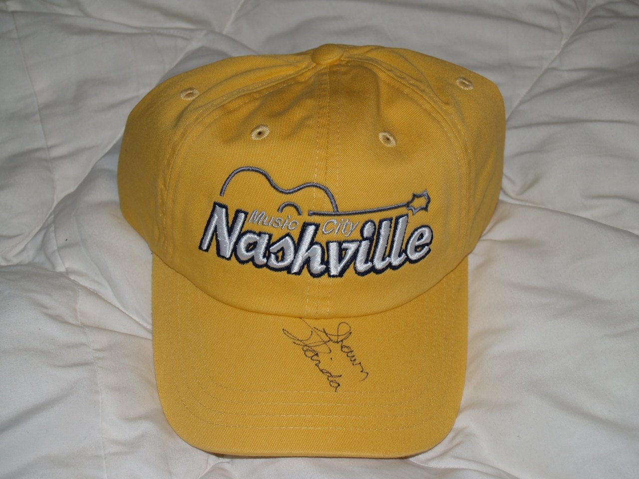 [yellow+autographed+hat.JPG]