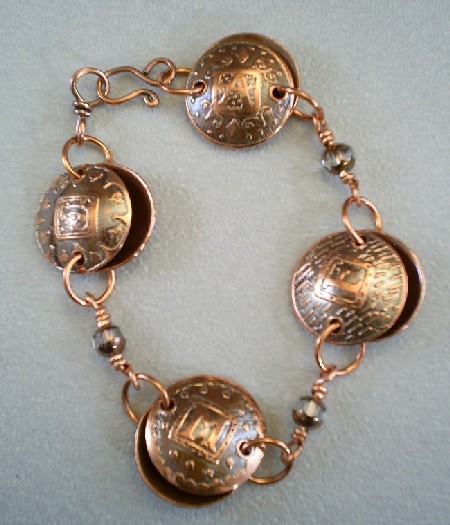 [moms+copper+charm+bracelet.JPG]