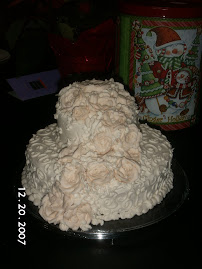 white almond cake white buttercream frosting with ivory roses