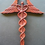 Wood Carving of a Medical Symbol
