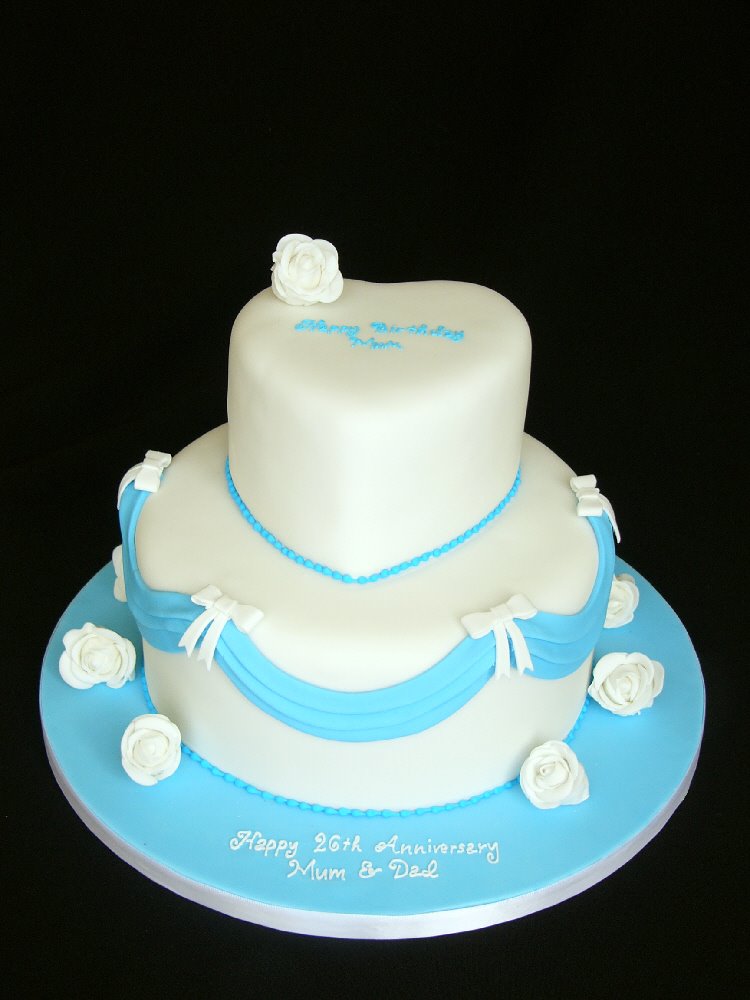 [Blue+and+White+Cake+with+Swags+Bows+and+Roses.jpg]