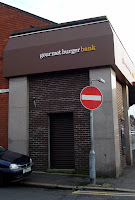 Exterior shot of Belmont Road's Gourmet Burger Bank
