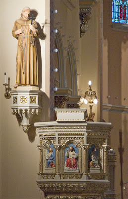 Saint Anthony of Padua Roman Catholic Church, in Saint Louis, Missouri, USA - pulpit and statue of Saint Francis of Assisi