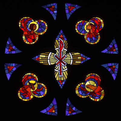 Sainte Genevieve du Bois Roman Catholic Church, in Warson Woods, Missouri, USA - Rose window with symbols of the four Evangelists