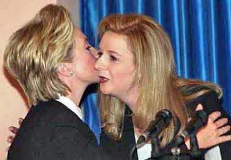Hillary Clinton planting a kiss on the