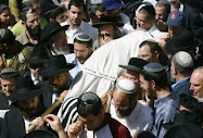 Israeli mourners carry the body of Segev Pniel Avihayil, 15,