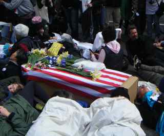 [A+coffin+draped+with+an+American+flag+and+flowers.jpg]