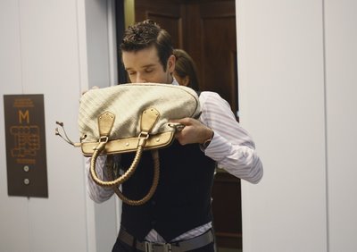[Marc+smelling+purse.jpg]