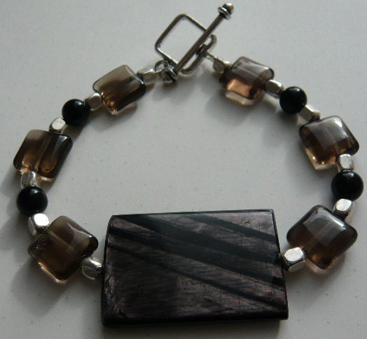 [sardonyx,+black+agate,+and+smokey+quartz+bracelet.jpg]
