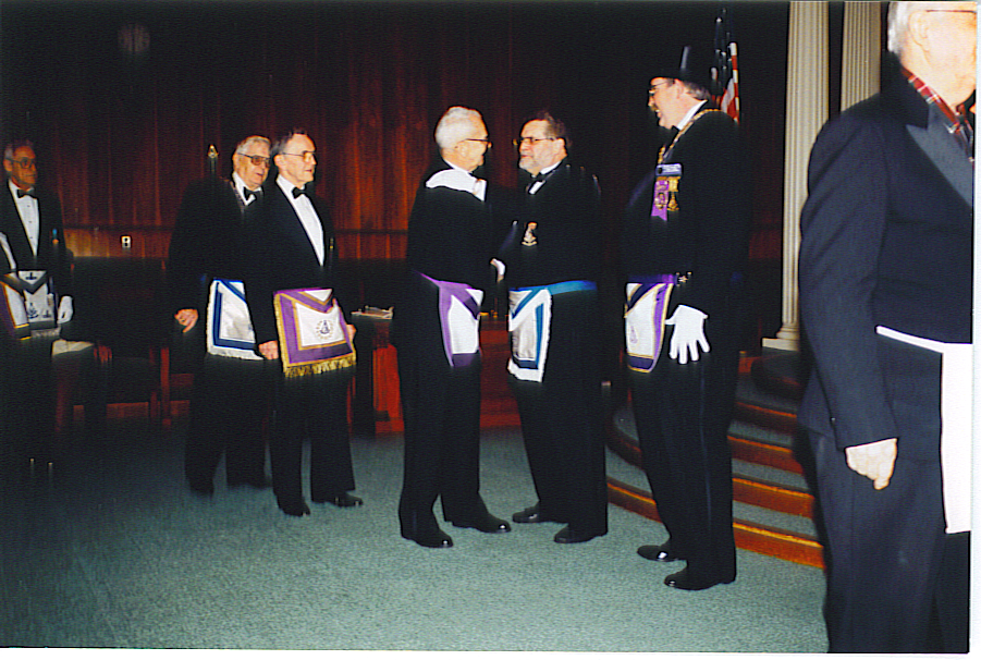 Past Joseph Warren Medal Holders Congratulating Brother Dick