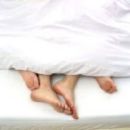 [couple+feet+in+bed.jpg]
