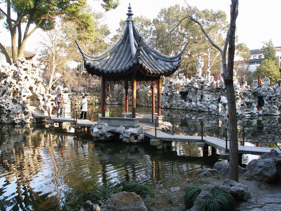 [Chinese+garden+lake+surrounded+by+rock+walls.JPG]