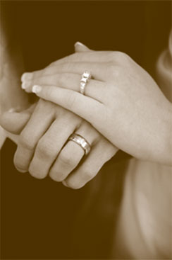 [wedding-rings-and-hands.jpg]