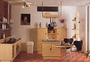 Modern miniature dolls' house kitchen in blonde wood with black details.