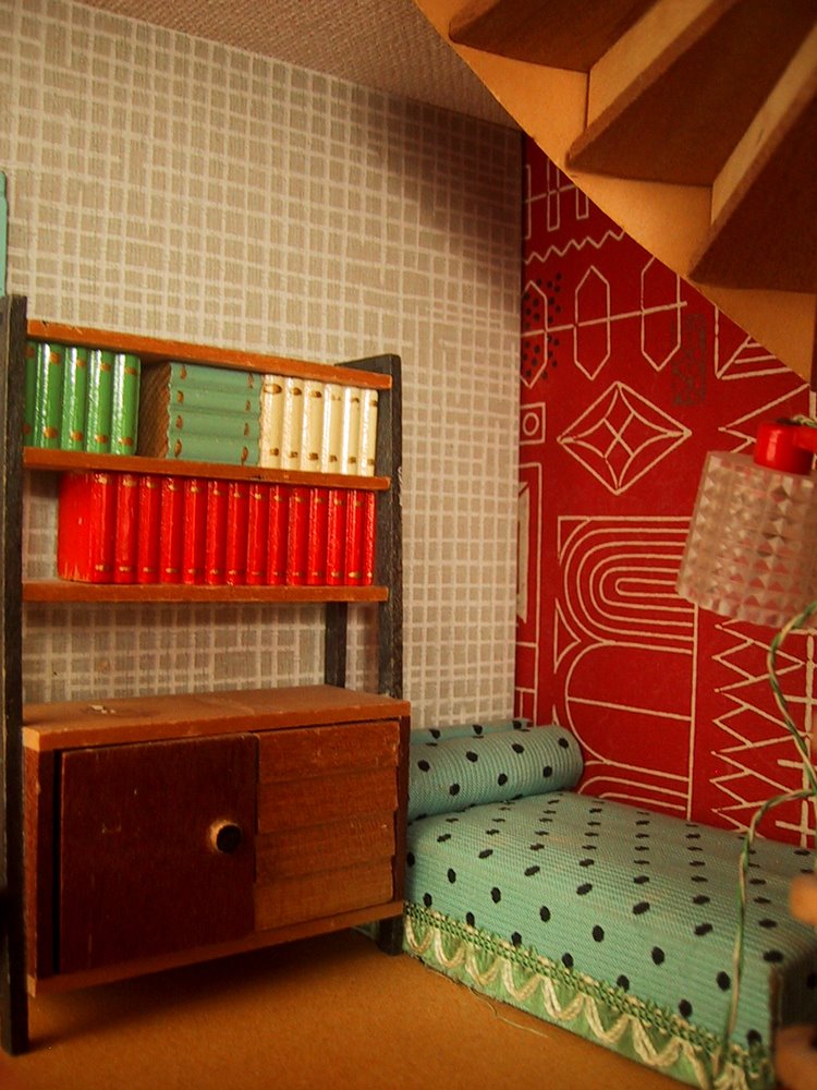 Vintage 1957 Lundby dolls' house reading nook under the stairs.