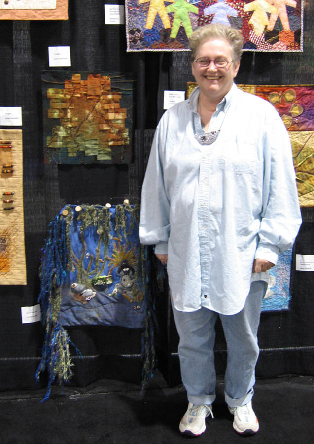 [vickie+boteler+with+quilt.jpg]