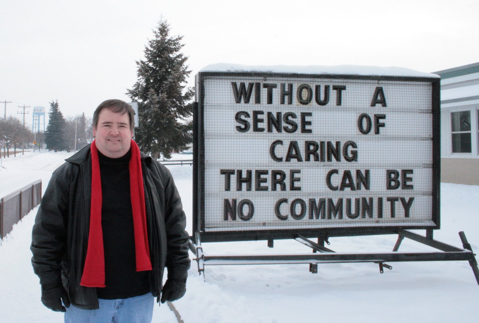 [Earl+with+caring+community+sign.jpg]