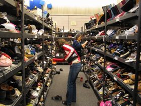 [280px-Shopping_for_shoes.jpg]