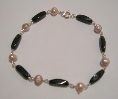 [sun+stone+and+pearls+silver+bracelet.jpg]
