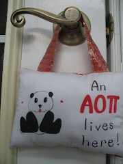 <a href="http://www.sororitygifts.etsy.com">AOII Panda Hang-up Pillow</a>
