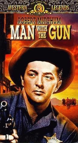 [man+with+the+gun.jpg]