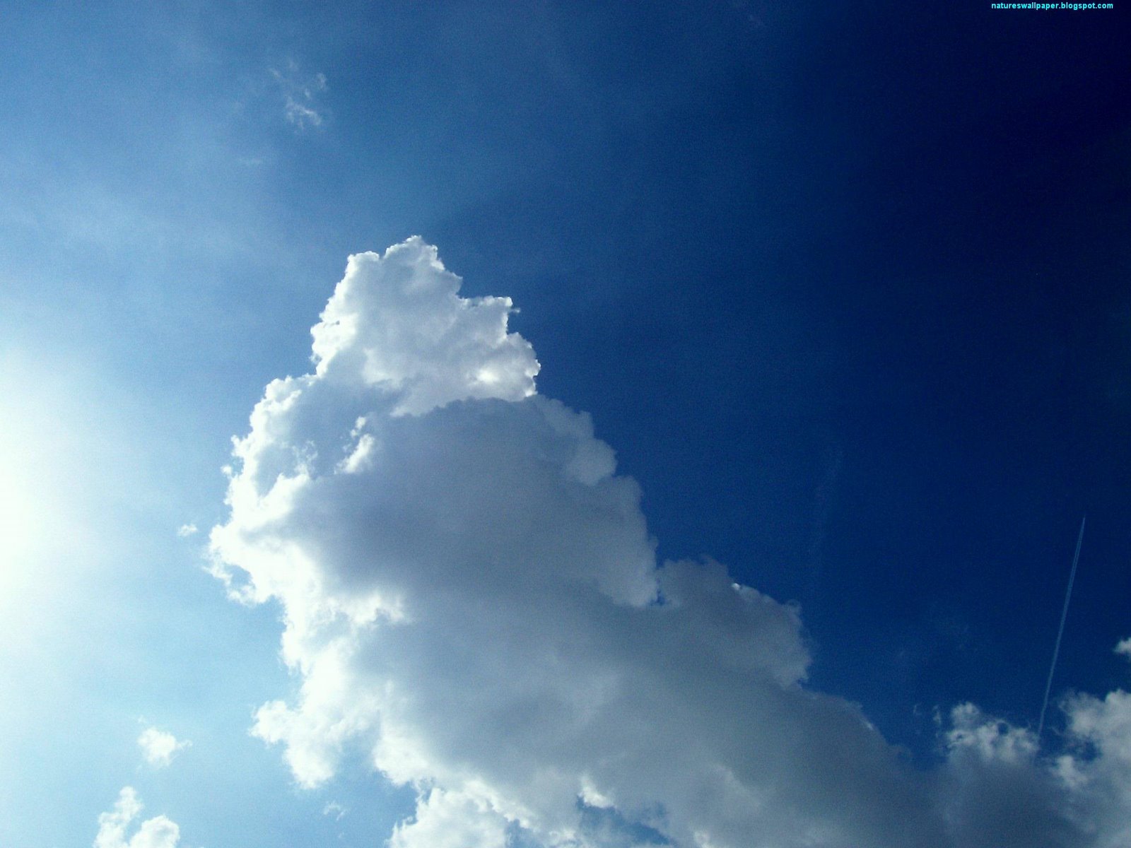 [Clouds+With+Plane+Streak.jpg]