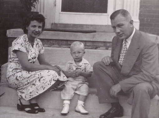 [Aug+1947+-+18+mos.+w+Mom+&+Dad+on+front+stoop.jpg]