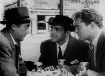 [rififi215Discussing+the+job+at+a+French+cafe.jpg]