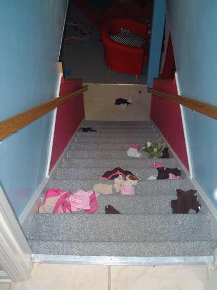 clothes thrown down stairs