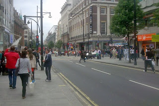 Crowded Oxford Street in Central London's West End on a busy Sunday morning