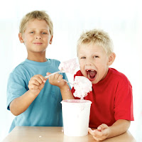 boys eating frozen treat